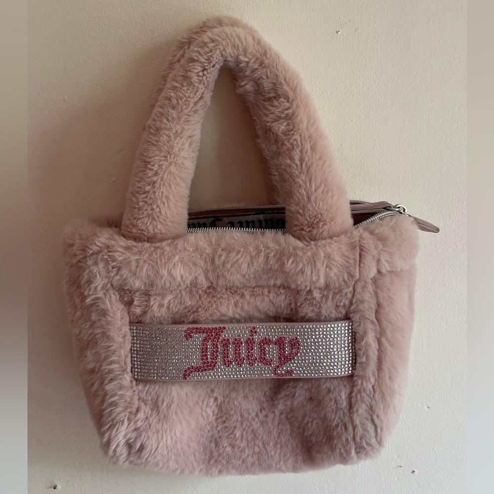 Juicy couture small pink fuzzy hand bag.
